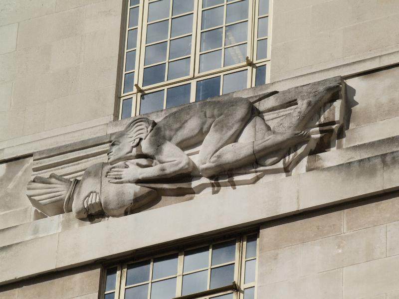 London, England: Broadway, Transport for London (originally London Underground): East Wind (1928-1929, sculptor Allan Wyon, architect Charles Holden)