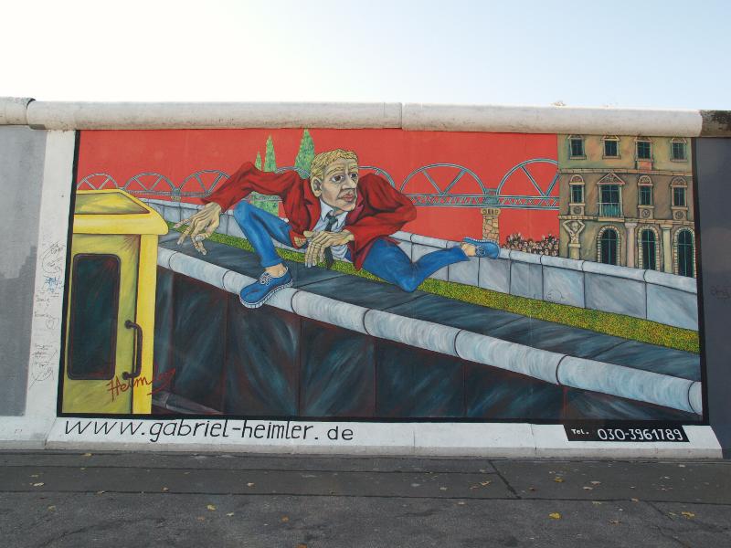 Berlin, Germany: East Side Gallery (Berlin Wall): Der Mauerspringer (Wall jumper) (Gabriel Heimler)