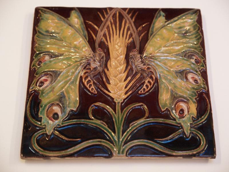 London, England: British Museum: earthenware tile with butterflies on wheat ears (about 1900, designed by Rafael Bordalo Pinheiro)