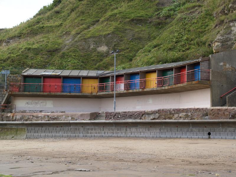 Scarborough, England: beach: modern (1970s?) beach huts