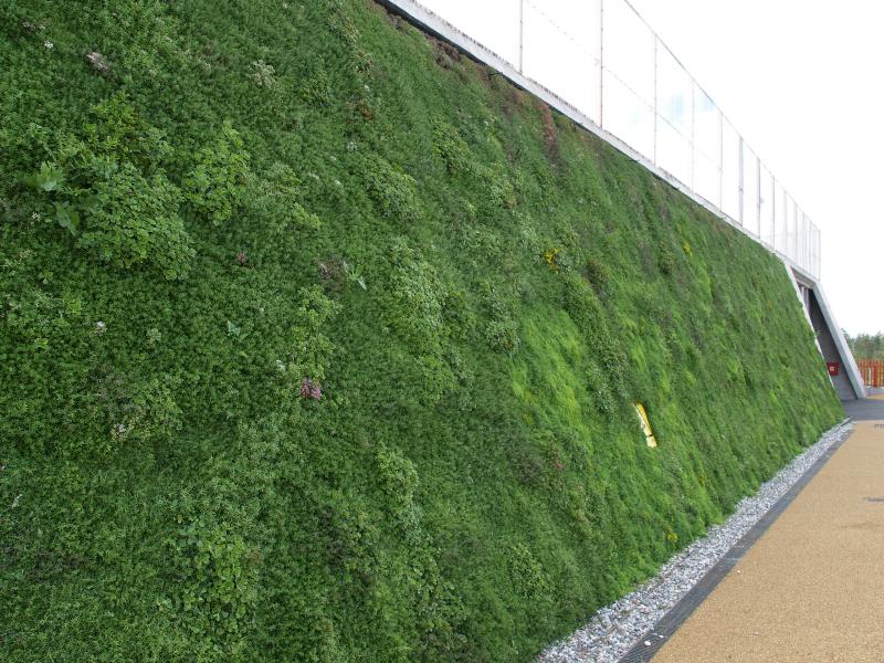 London, England: Olympic Park, electricity substation: green wall