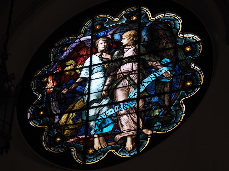 Utica, New York (NY): Grace Church: south rose window (two angels with torch and sickle) (1886, Henry Holiday)