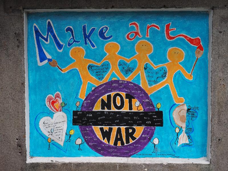 London, England: Wanstead tube station: Make Art Not War (2014, Sam Cowan)