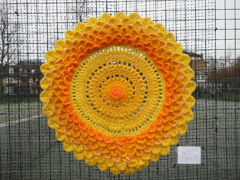 Cambridge, England: Jesus Green: yellow and orange disk (displayed Dec 2020 / Jan 2021, artist Tigerchilli)