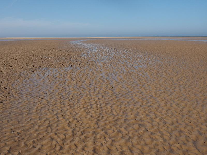 Wells-next-the-Sea, England: beach: wet sand to the horizon