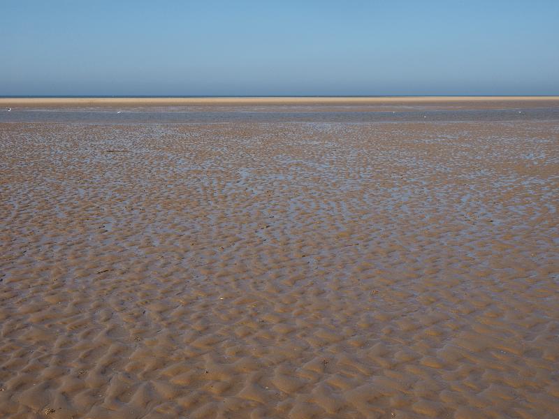 Wells-next-the-Sea, England: beach: wet sand to the horizon