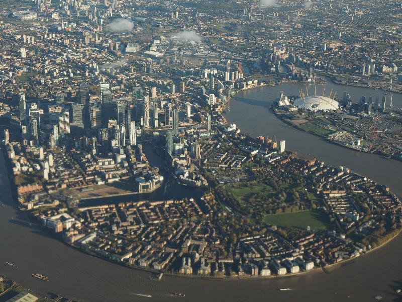 London, England: Canary Wharf and the Millennium Dome: aerial view