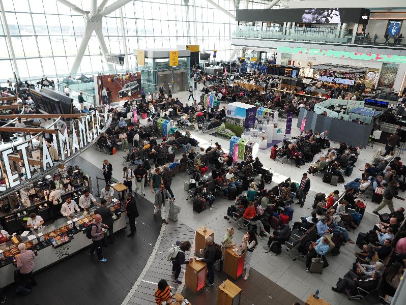 London, England: Heathrow Airport, Terminal 5: terminal crowded again, post Covid-19