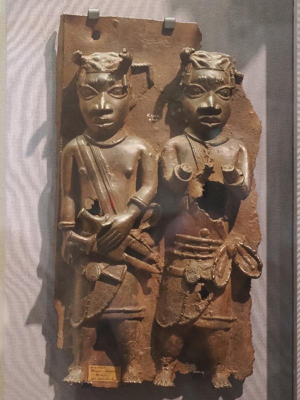 Cambridge, England: Museum of Archaeology and Anthropology: two men (Benin bronze plaque)