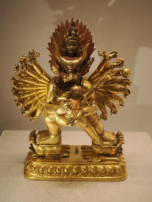 London, England: British Museum: Buddhist figure (gilt-bronze and cold painting in coral red, blue and black pigment, 1811, Beijing)