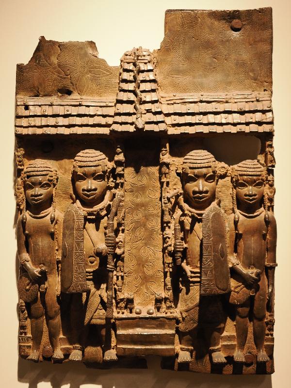 London, England: British Museum: cast brass plaque, showing the facade of the royal palace (16th century, Benin, Nigeria)