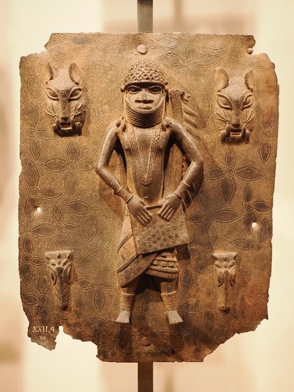 London, England: British Museum: cast brass plaque, man and two animal heads (16th century, Benin, Nigeria)