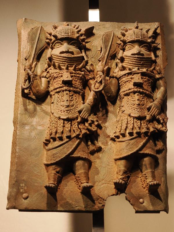 London, England: British Museum: cast brass plaque, two men (16th century, Benin, Nigeria)