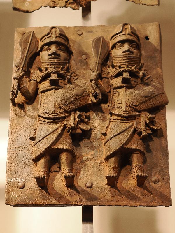 London, England: British Museum: cast brass plaque, two men (16th century, Benin, Nigeria)