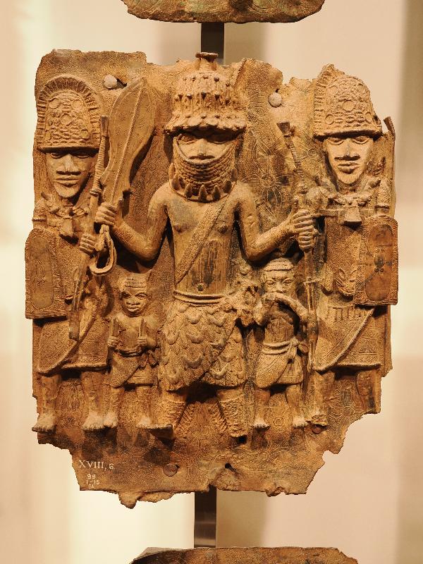 London, England: British Museum: cast brass plaque, three large men and two small men (16th century, Benin, Nigeria)