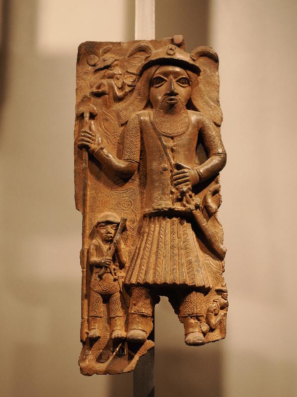 London, England: British Museum: cast brass plaque, one large man and one small man (16th century, Benin, Nigeria)
