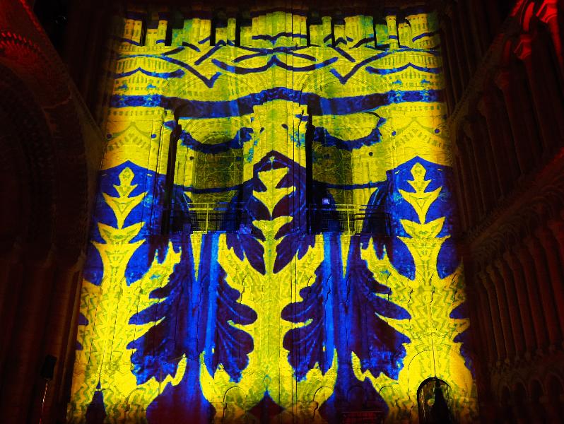 Ely, England: Ely Cathedral: blue and yellow design (Crown and Coronation, by Luxmuralis, originally shown at Tower of London, Nov 2023)