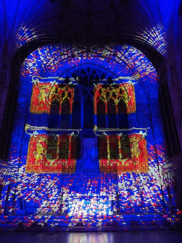 Ely, England: Ely Cathedral: royal standard (Crown and Coronation, by Luxmuralis, originally shown at Tower of London, Nov 2023)