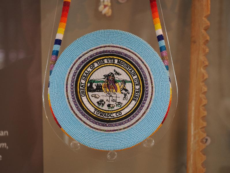Flagstaff, Arizona (AZ): Museum of Northern Arizona: Panakarukunavu (purse) (early 21st century) (leather, glass beads, embroidered patch with Ute Mountain Ute tribal seal)