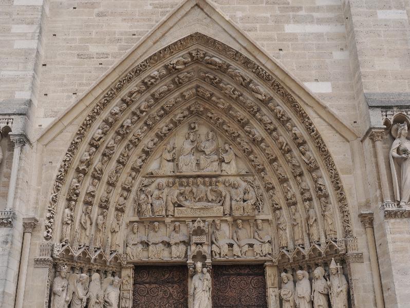 Paris, France: Notre-Dame Cathedral: tympanum over left door