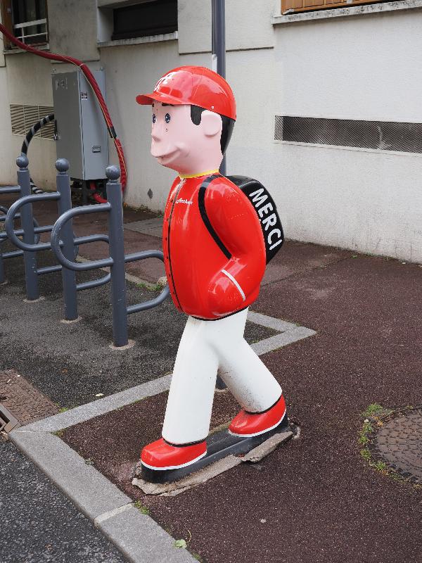 Issy-les-Moulineaux, France: Rue de l'Abbe Gregoire: crosswalk child, red