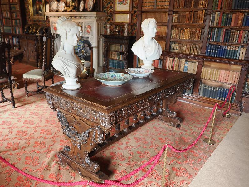 Oxburgh Estate, England: Oxburgh Hall, Library: table and busts