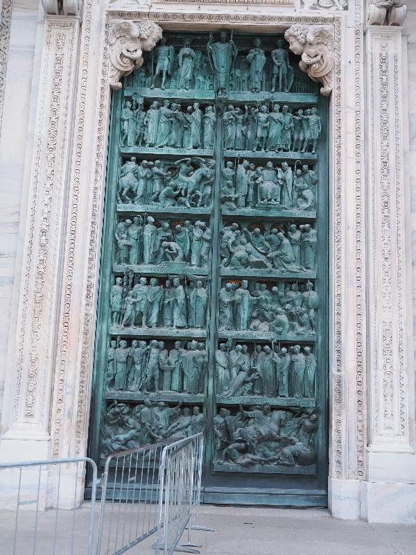 Milan, Italy: Duomo di Milano: left of central entrance, The Life of Saint Ambrose (1950, Giannino Castiglioni)