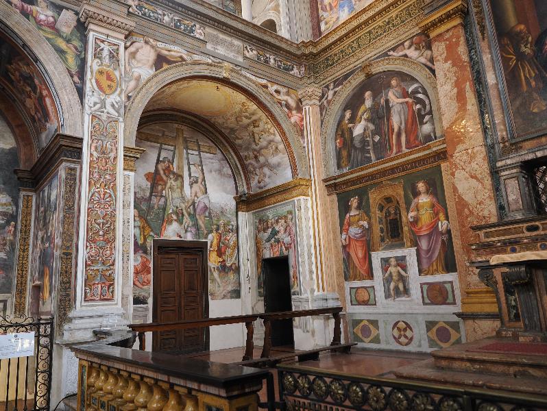 Milan, Italy: Chiesa di San Maurizio al Monastero Maggiore: Chapel of Ecce Homo (Bentivoglio), Descent from the Cross; Saints Stephen, Benedict and John the Baptist, with a devotee; Saints Cecilia and Giustina of Padua