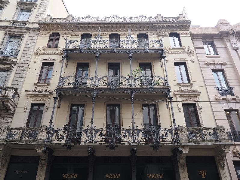 Milan, Italy: Via Spadari: facade, Art Nouveau balustrade