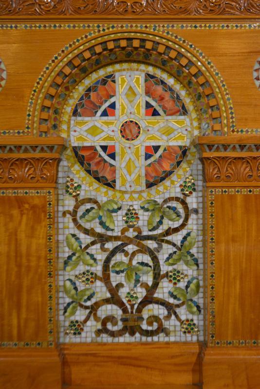 mosaic and tilework on pulpit, chancel rail and sedilia