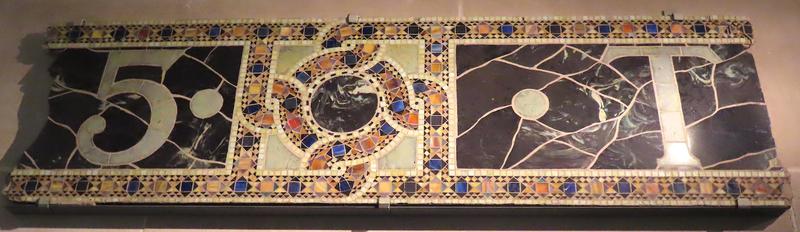 fragments of Tiffany Studios building signage