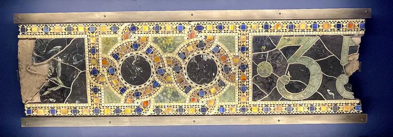 fragment of Tiffany Studios building signage