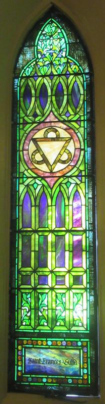 Saint Frances' Guild Window:  ornamental with a geometric symbol of the Trinity