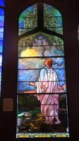 Texas, San Juan, Gelman Stained Glass Museum: female figure looking in the distance