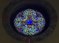 two small jeweled rose windows