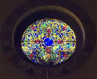 two small jeweled rose windows